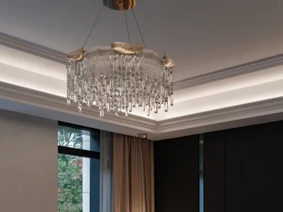Modern bedroom with a gray fabric bed, glass chandelier, and metal headboard.