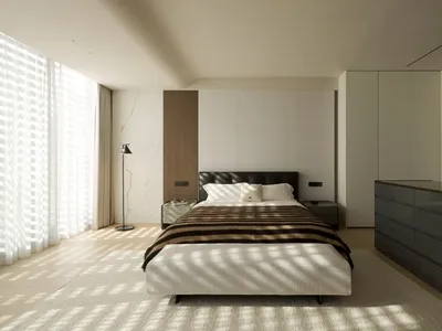 Modern minimalist bedroom with white and gray color palette, sleek furniture, and large window allowing natural light.
