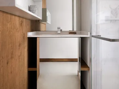 A modern hotel suite featuring granite countertops.