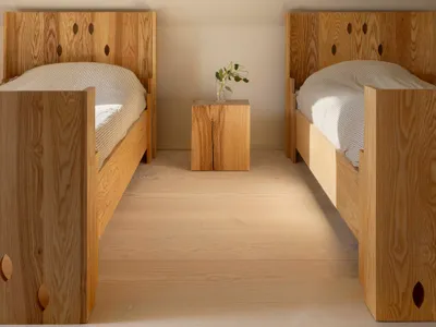 Minimalist bedroom with wood furniture and natural light