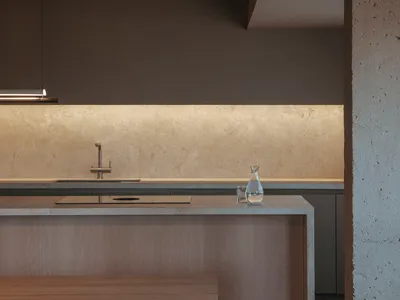 Modern minimalist kitchen interior with concrete finishes and sleek, contemporary fixtures.