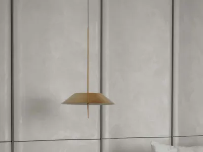 Modern bedroom showcasing metallic accent lamp and concrete paneling headboard