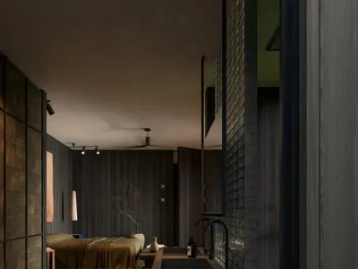 A minimalist bedroom featuring dark wooden paneling and concrete bathroom elements.