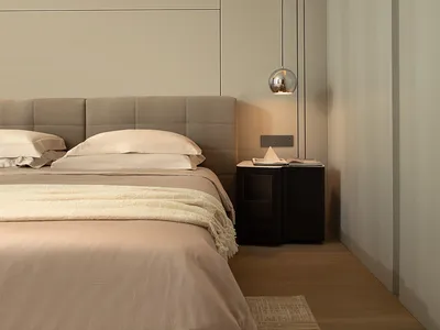 A minimalist bedroom with beige-colored furniture and materials, featuring a bed with a beige headboard and beige bedding, a