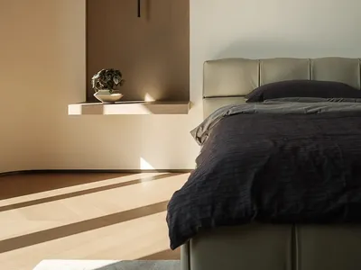 A modern minimalist bedroom featuring a neutral color palette, includes a minimalist bed frame and a floating shelf with a sm