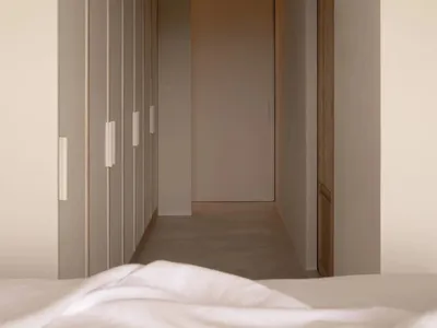 極簡臥室，採用混凝土與木質材料。
