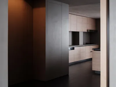 Modern kitchen with wooden cabinets and a minimalist design.