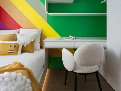 A minimalist bedroom with colorful stripes on the wall, white furniture, and a white chair.