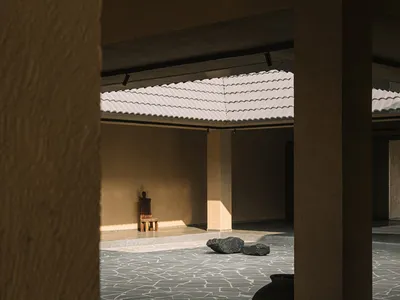A minimalist lounge area with a concrete roof, focusing on modern, sleek design elements.