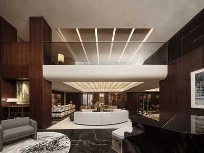 Modern hotel suite featuring marble and wooden finishes.