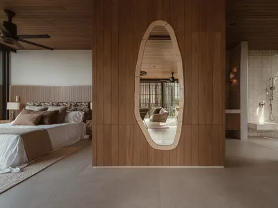 Modern minimalist bedroom with wooden flooring and furniture