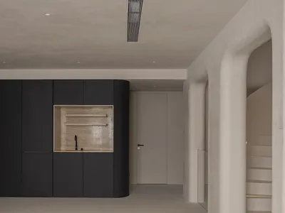 A minimalist residential kitchen with black and white concrete finishes and black cabinets.