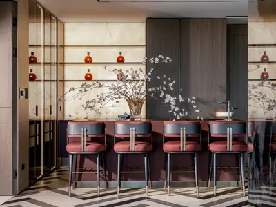 Modern bar counter space featuring a combination of marble and wood materials.
