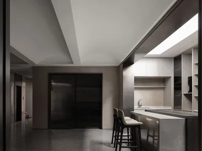 A modern minimalist kitchen with concrete finishes and sleek, dark cabinets.