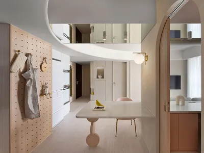 現代極簡廚房與餐廳區域，採用混凝土與大理石材質。