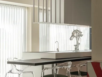 Modern kitchen featuring polished concrete surfaces and minimalist design.