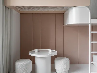 A minimalist bedroom featuring a modern bunk bed system with white furniture and soft furnishings against a brown upholstered