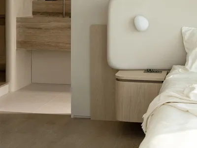 Modern minimalist bedroom featuring neutral tones and clean lines