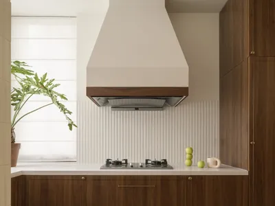 Modern kitchen featuring wooden cabinets with a sleek, clean design.