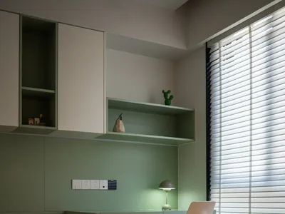 A modern bedroom featuring granite elements
