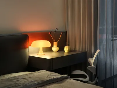 Modern bedroom featuring fabric curtains with a soft, warm light ambiance.