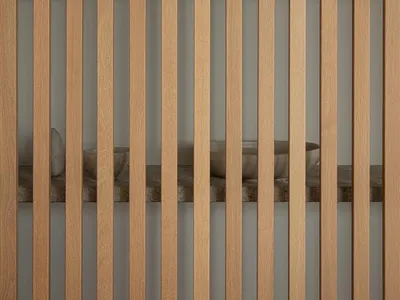Modern kitchen featuring wooden slats on the wall