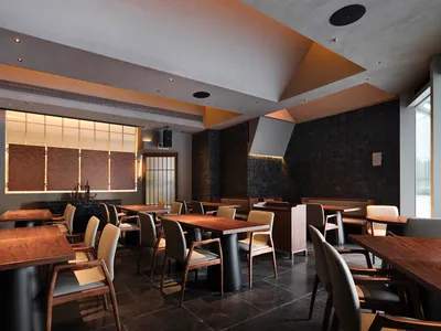 A modern restaurant interior featuring wooden tables and chairs, with a minimalist design aesthetic.