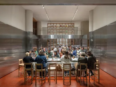 People dining at a metallic restaurant interior