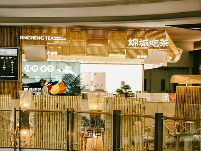 Japanese restaurant interior with bamboo decorations and glass elements