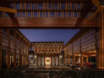 Modern restaurant interior designed with wooden materials.