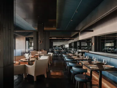 Modern restaurant interior featuring concrete, wood, and leather materials.