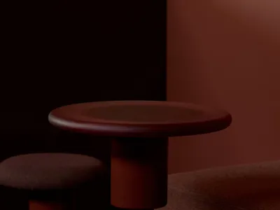 Wooden restaurant booth with upholstered seating in an industrial style setting.