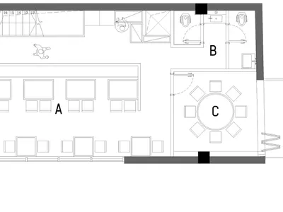 Floor plan of a modern restaurant dining area with brick flooring and metal tables.