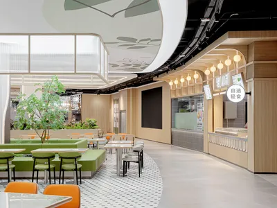 Modern restaurant interior featuring green upholstery on seating, wooden benches, and glass partition.