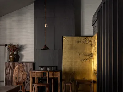 Industrial restaurant interior with metallic and wooden materials