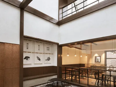 Modern coffee shop interior with wood and concrete features