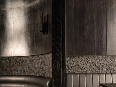 Black leather restaurant booth seats