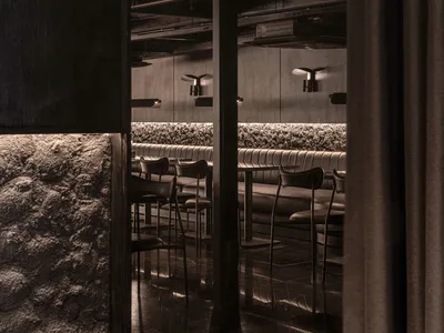 The lighting and seating arrangement in a modern restaurant interior.