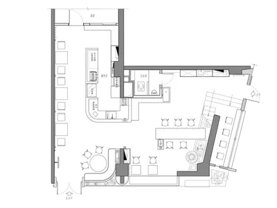 A detailed black and white architectural floor plan of a modern restaurant's layout, showing kitchen, dining area, and operat