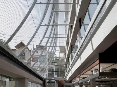 Industrial-style restaurant interior with concrete and glass materials