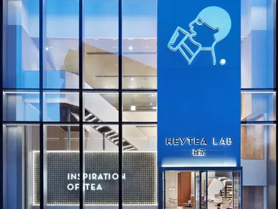 The minimalist glass exterior facade of a restaurant
