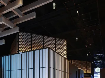 Modern restaurant interior featuring metallic grid walls