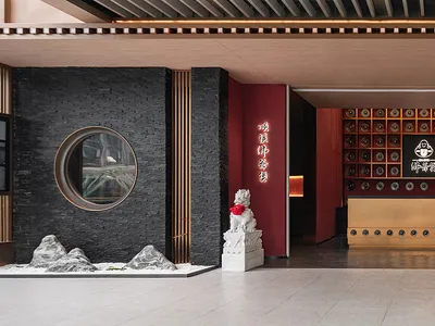 Modern restaurant entry way featuring wooden panels and marble flooring.