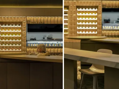 A modern restaurant interior featuring a bar counter with acrylic lighting.