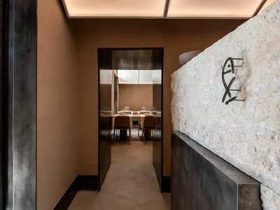 Modern concrete restaurant interior showcasing contemporary design features
