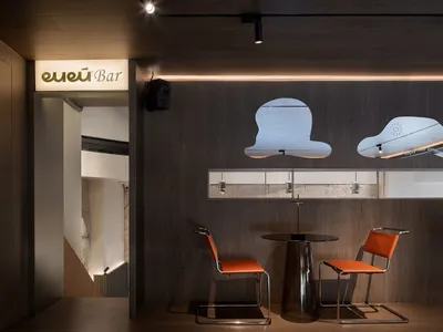 Modern restaurant interior with industrial design elements in metal and wood