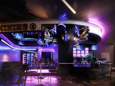 現代未來風格的餐廳酒吧，配有金屬機械臂與霓虹燈光照明。