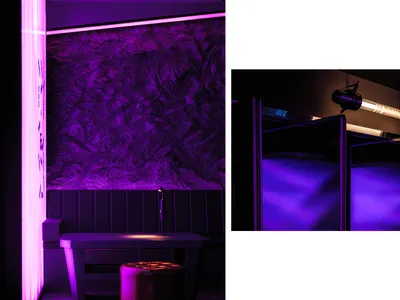 Interior design of a modern restaurant featuring concrete walls and a minimalist design.