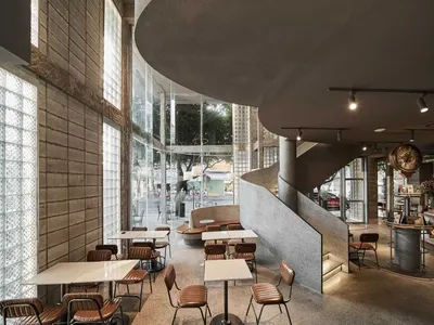 當代餐廳室內空間，融入現代混凝土元素。