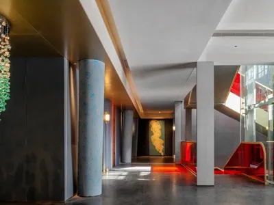 Modern hotel lobby featuring metallic design elements